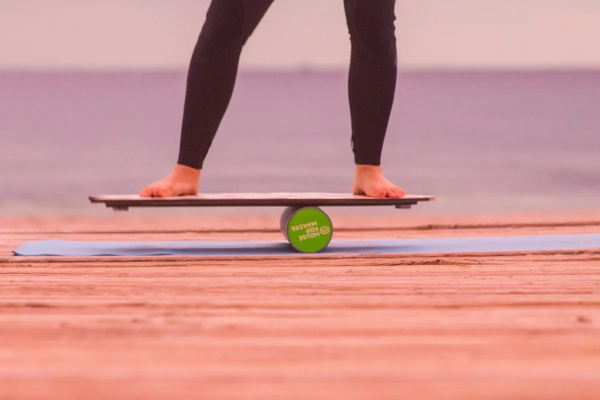 Feet balancing on a wobble board