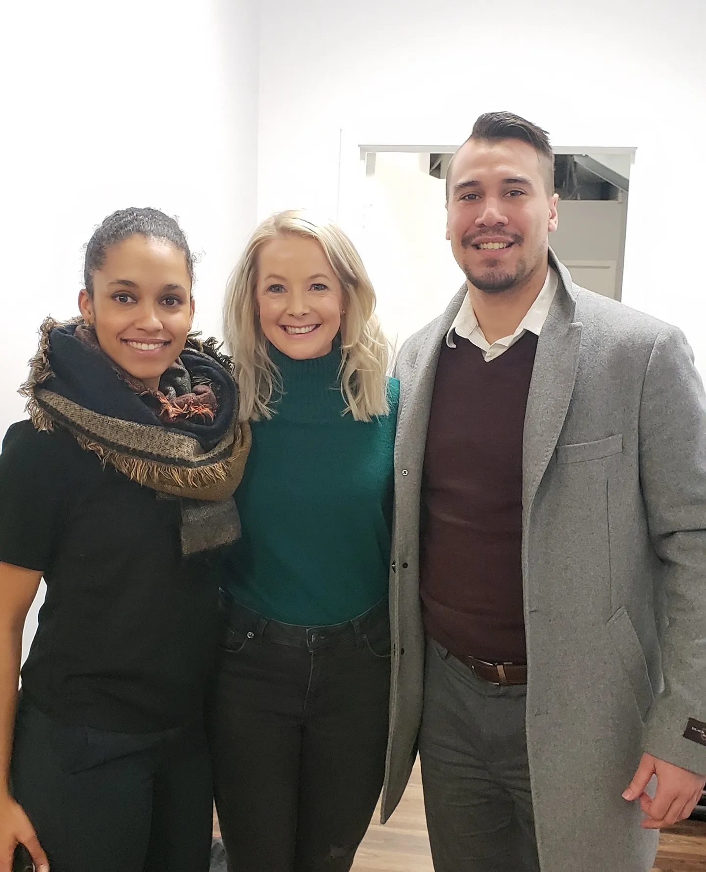 Roman with colleagues at a continuing-education workshop